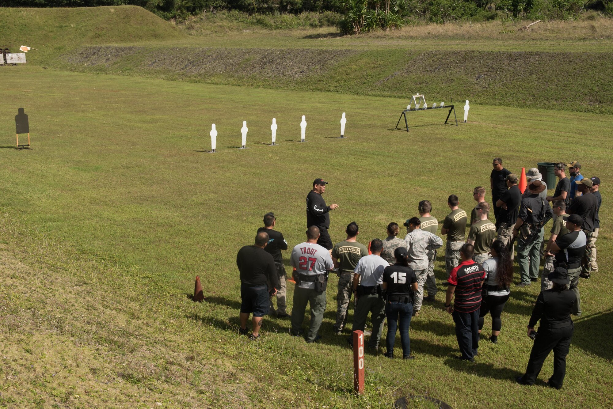 Silvano Uribe, Guam Police Department armorer, briefs shoot-off participants about range procedures April 29, 2017, at Naval Computer and Telecommunications Station, Guam. During each heat, participants flowed from the rifle, shotgun and pistol stages with the goal of hitting as many targets as possible in the shortest amount of time. (U.S. Air Force photo by Airman 1st Class Jacob Skovo)