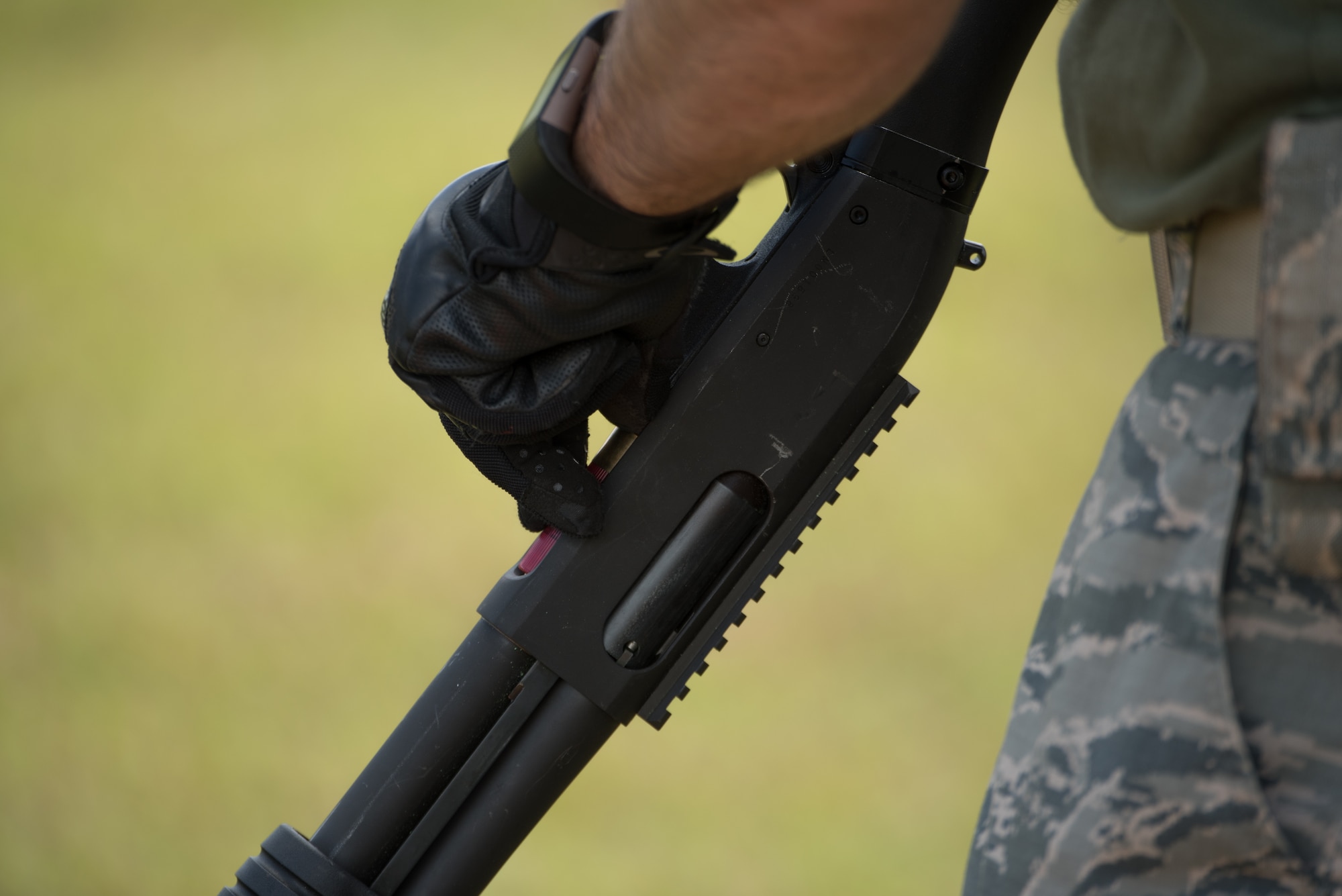 U.S. Air Force Staff Sgt. Andrew Loren, 36th Security Forces Squadron flight chief, loads an M870 shotgun April 29, 2017, at Naval Computer and Telecommunications Station, Guam. Competitors were required to reload before shooting the last target in both the shotgun and pistol portions of the three gun shoot-off. (U.S. Air Force photo by Airman 1st Class Jacob Skovo)