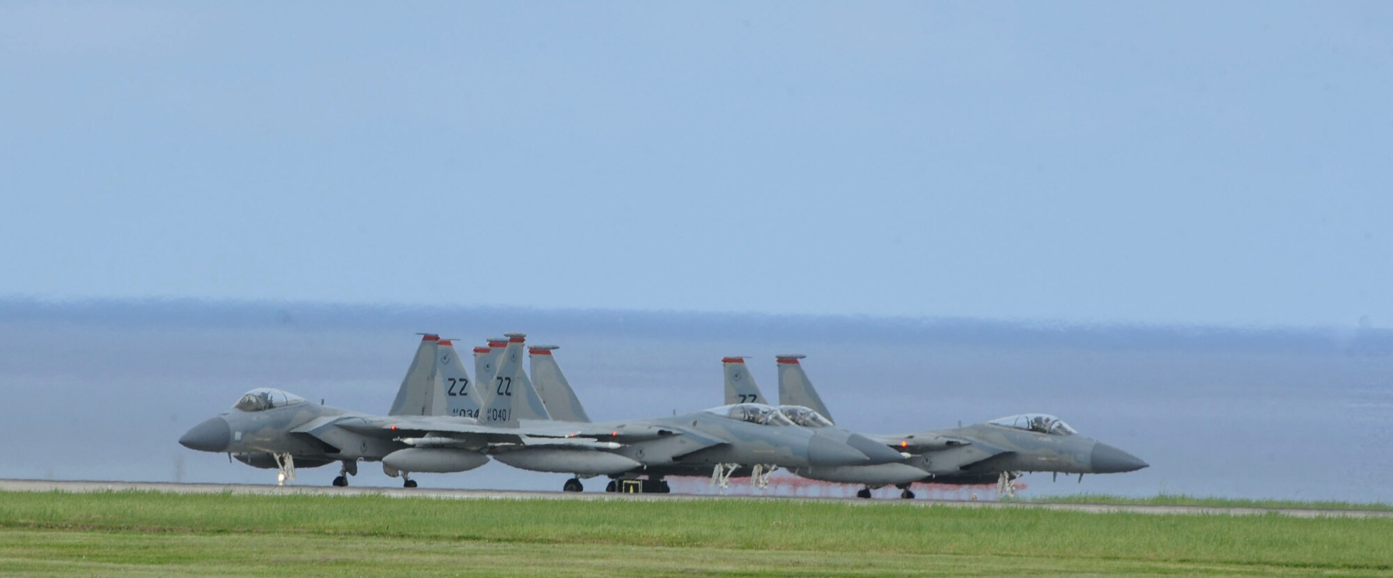 U.S. Air Force F-15 Eagles assigned to the 67th Fighter Squadron prepare to take off down the runway June 7, 2017, at Kadena Air Base, Japan. The 67th FS is one of two USAF F-15 Eagle units in the Pacific area of operations. (U.S. Air Force photo by Senior Airman Lynette M. Rolen)