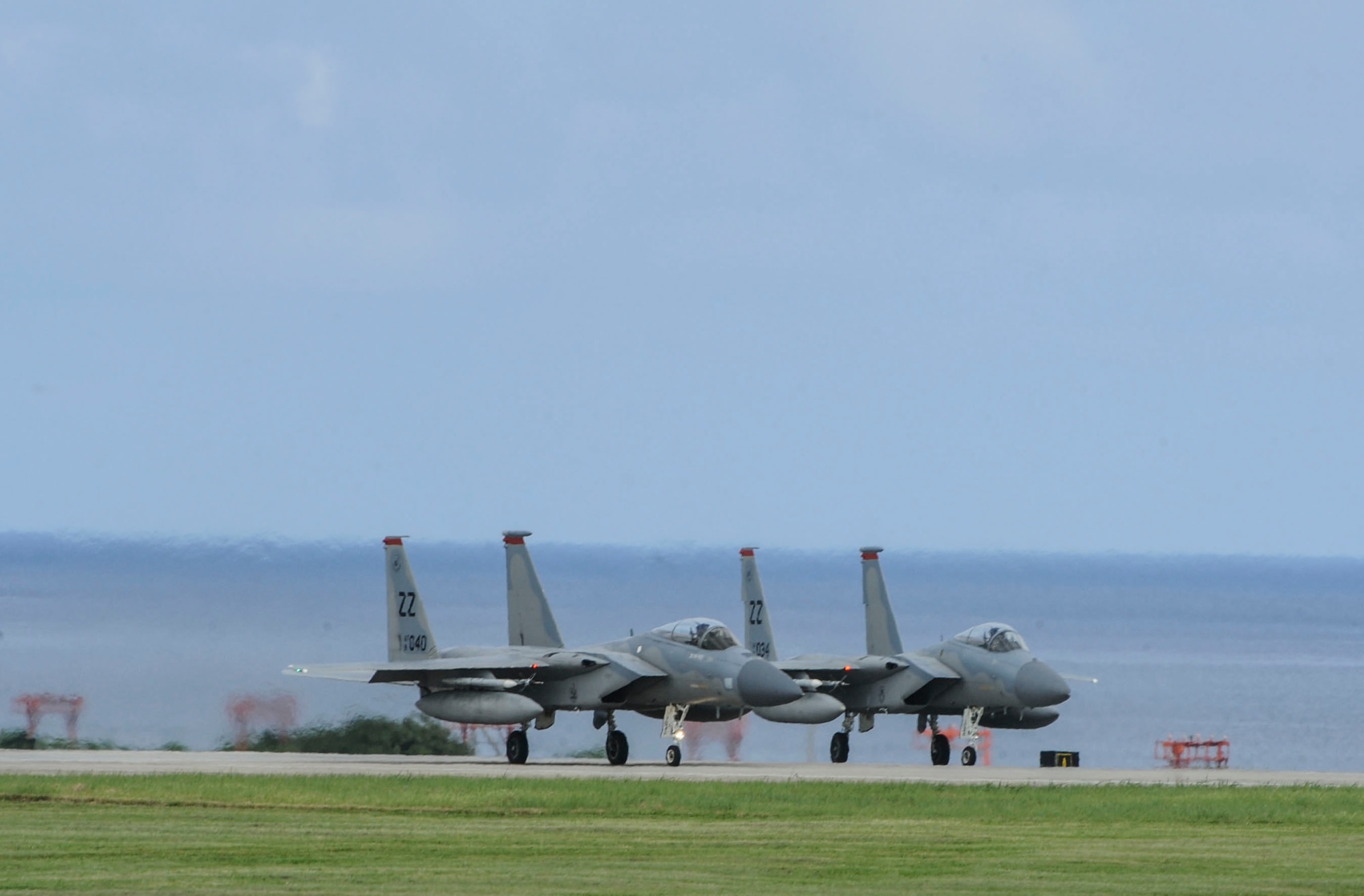 U.S. Air Force F-15 Eagles assigned to the 67th Fighter Squadron prepare to take off down the runway June 7, 2017, at Kadena Air Base, Japan. The F-15 is a classic all-weather, highly maneuverable war-fighting jet capable of being equipped with a variety of air-to-air weaponry. (U.S. Air Force photo by Senior Airman Lynette M. Rolen)
