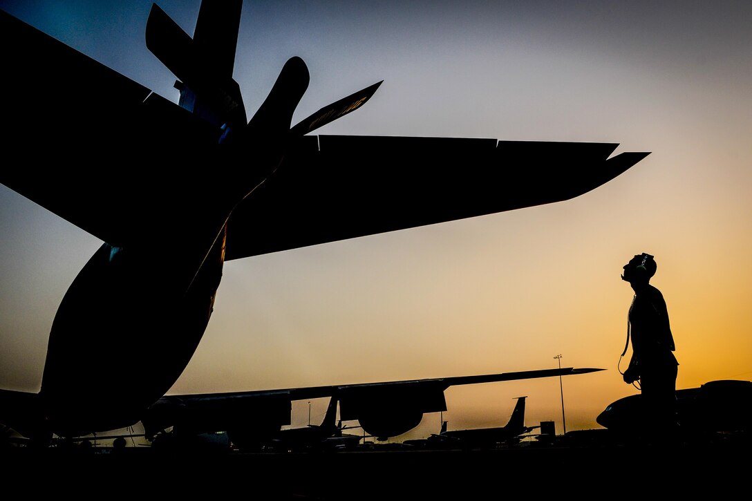 An Air Force maintainer inspects the boom of a KC-135 Stratotanker at Al Udeid Air Base, Qatar, June 7, 2017, before a flight supporting Operation Inherent Resolve. The maintainer is assigned to the 340th Aircraft Maintenance Unit. Air Force photo by Staff Sgt. Michael Battles