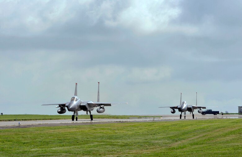 U.S. Air Force F-15 Eagles assigned to the 67th Fighter Squadron taxi for takeoff during a training sortie June 7, 2017, at Kadena Air Base, Japan. The training provides a unique opportunity for multiple units to fly together, helping ensure optimal training is conducted. (U.S. Air Force photo by Naoto Anazawa)