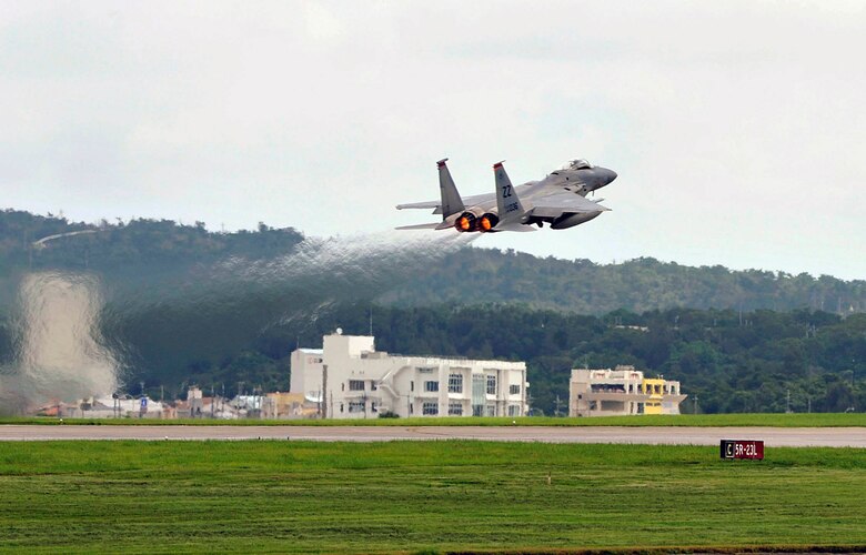 A U.S. Air Force F-15 Eagle assigned to the 67th Fighter Squadron takes off during a training sortie June 7, 2017, at Kadena Air Base, Japan. The Kadena's F-15 Eagles and F-16 Fighting Falcons conduct training missions frequently in order to build strategic partnerships and maintain peace and stability in the Pacific region. (U.S. Air Force photo by Naoto Anazawa)