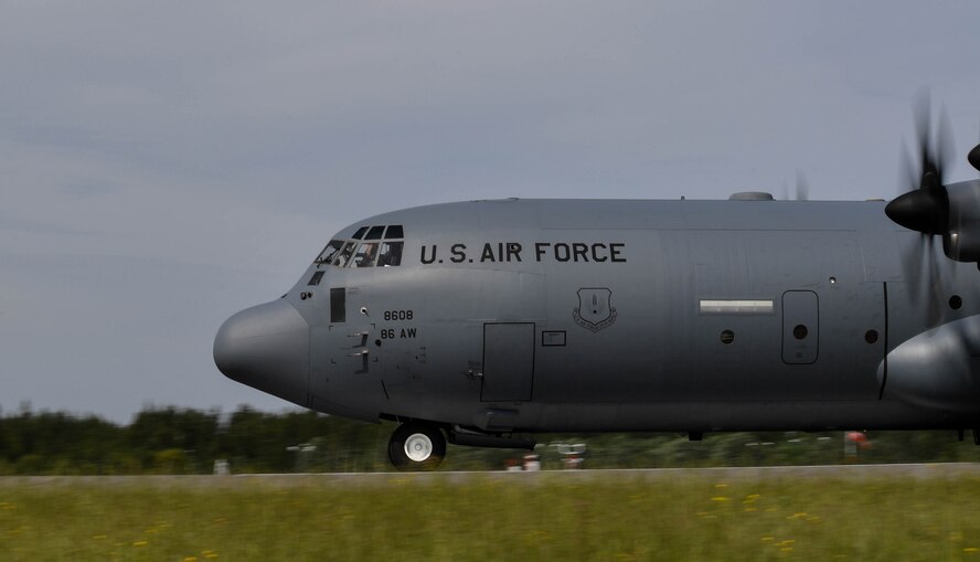 A U.S. Air Force C-130J Super Hercules travels down a runway after landing for exercise Saber Strike 17 on Lielvārde Air Base, June 7, 2017. Paratroopers from 435th Contingency Response Group from the 435th Air Ground Operations Wing at Ramstein Air Base, Germany, were planning to jump from the aircraft, but wind conditions permitted them from doing so. Saber Strike 17 promotes regional stability and security, while strengthening partner capabilities and fostering trust. (U.S Air Force photo by Senior Airman Tryphena Mayhugh)