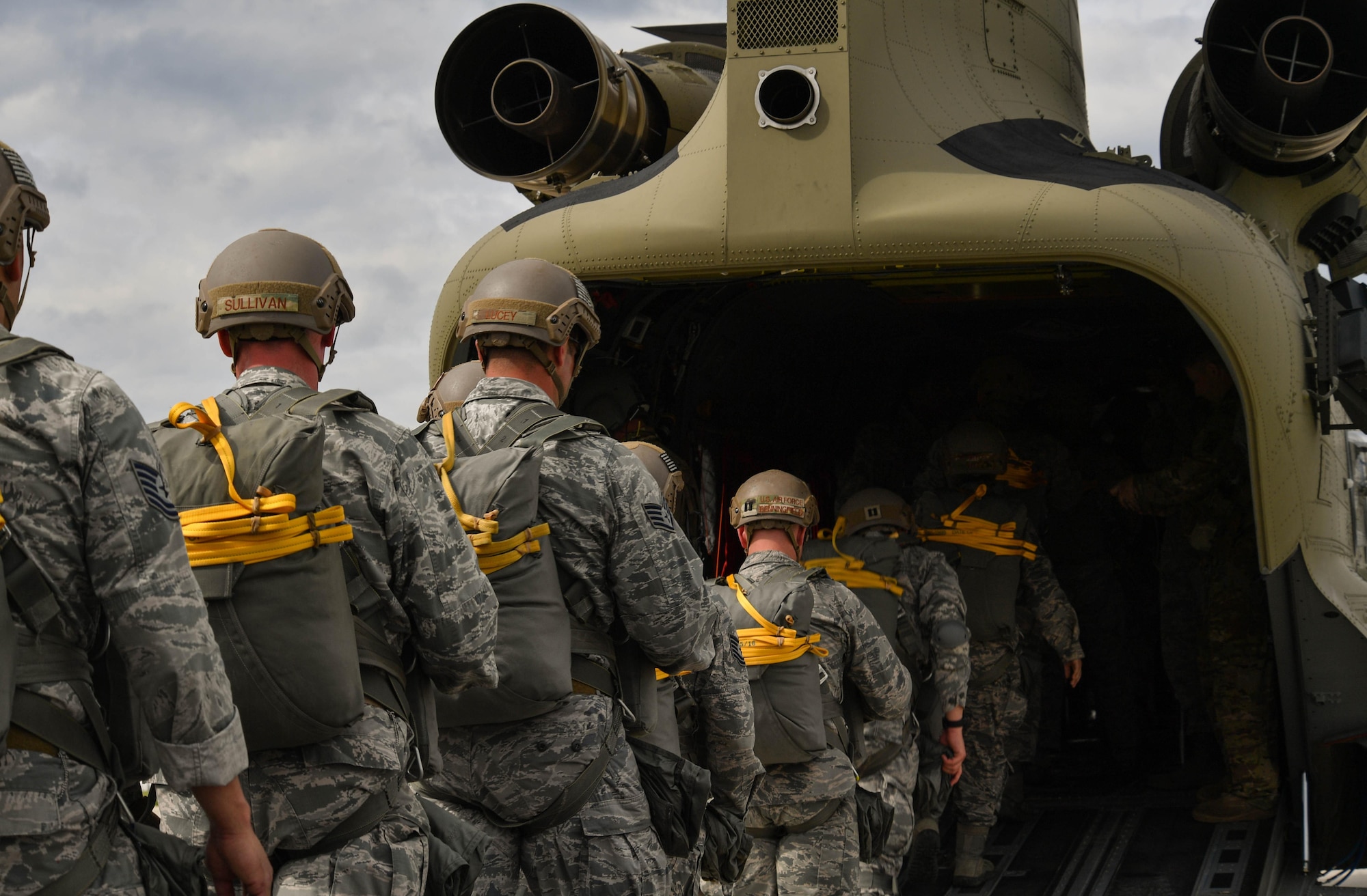 U.S. Air Force Airmen assigned to the 435th Contingency Response Group load into a U.S. Army CH-47 Chinook during exercise Saber Strike 17 at Lielvarde Air Base, Latvia, June 10, 2017. The 435th CRG sends paratroopers to austere locations to determine if an area can be safely used as an airfield. Saber Strike 17 promotes regional stability and security, while strengthening partner capabilities and fostering trust. (U.S Air Force photo by Senior Airman Tryphena Mayhugh)