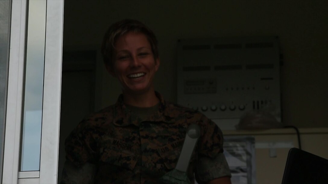 Sgt. Krista Marshik talks about her experience as the Combat Pistol Program tower voice on Camp Hansen, Okinawa, Japan. Marshik, an Arden Hills, Minnesota native, explains how working as the voice of the tower gave her a chance to open up and find more confidence in herself. Marshik is an ammunition technician with the Formal Marksmanship Training Unit, III Marine Expeditionary Force. (U.S. Marine Corps photo by Lance Cpl. Charles Plouffe)