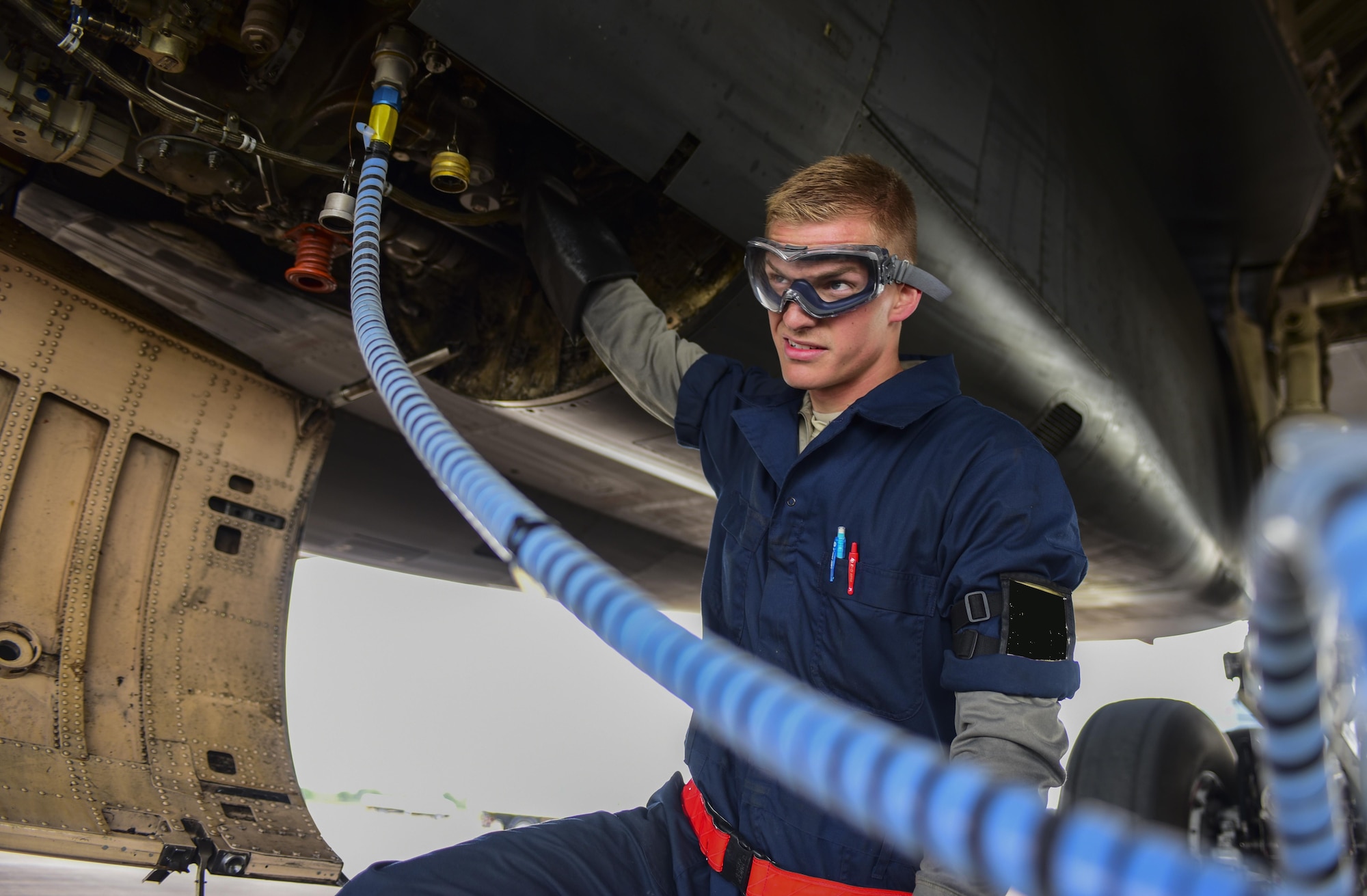 U.S. Air Force Airman 1st Class John Parker, 28th Aircraft Maintenance Squadron assistant dedicated crew chief, services the oil on a B-1B Lancer from Ellsworth Air Force Base at Royal Air Force Fairford, U.K., June 7, 2017. Airmen from the 28th Aircraft Maintenance Squadron are supporting bomber assurance and deterrence missions in the European theatre that combine training opportunities and improve interoperability among participating NATO allies and regional partners. (U.S. Air Force photo by Airman 1st Class Randahl J. Jenson)