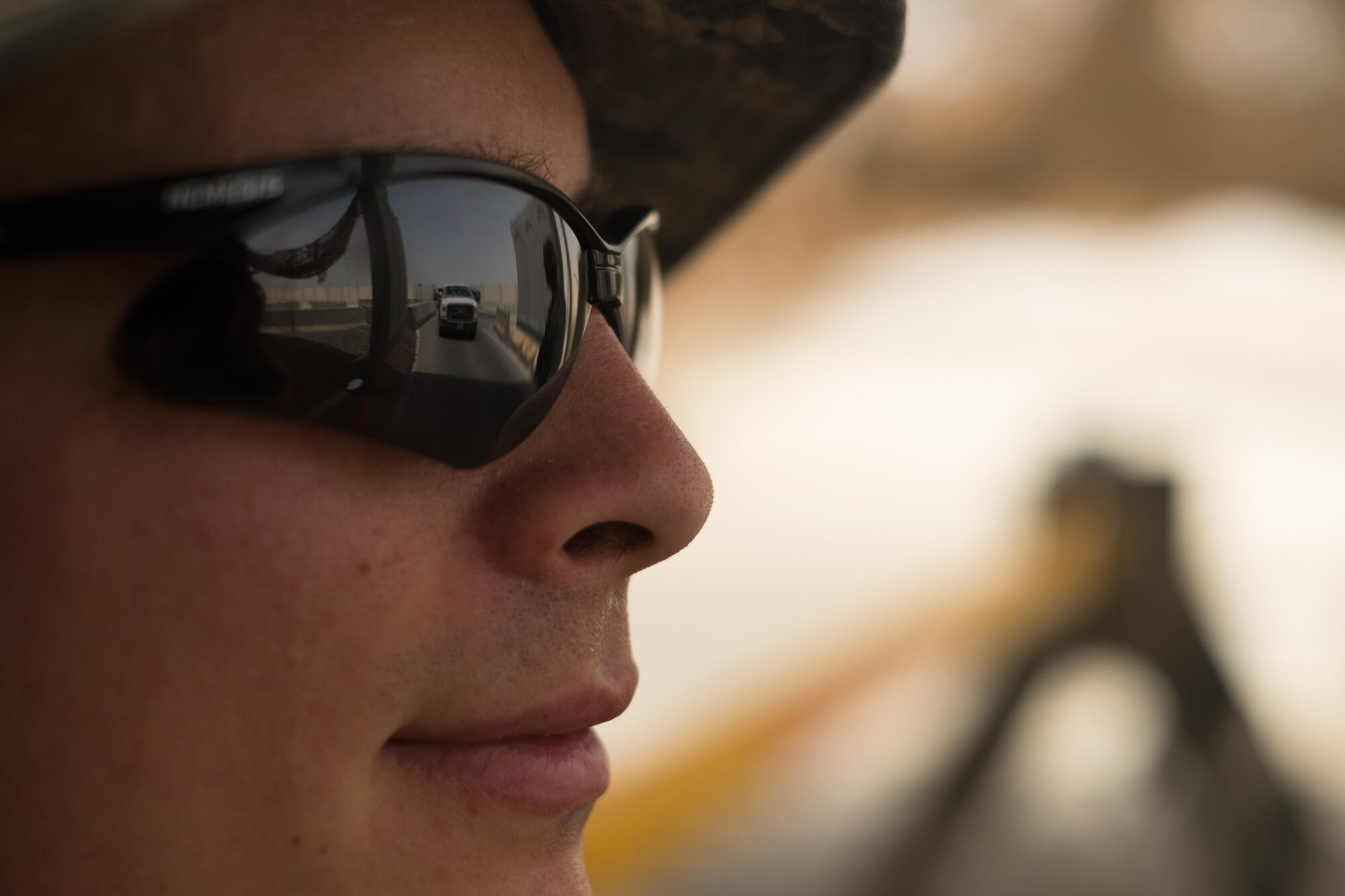 Staff Sgt. John, 380 Expeditionary Security Forces Squadron installation entry controller, watches a vehicle approach a gate June 7, 2017, at an undisclosed location in southeast Asia. 380 ESFS Airmen enforce the physical security of the installation through 100 percent verification of incoming personnel. (U.S. Air Force photo by Senior Airman Preston Webb)
