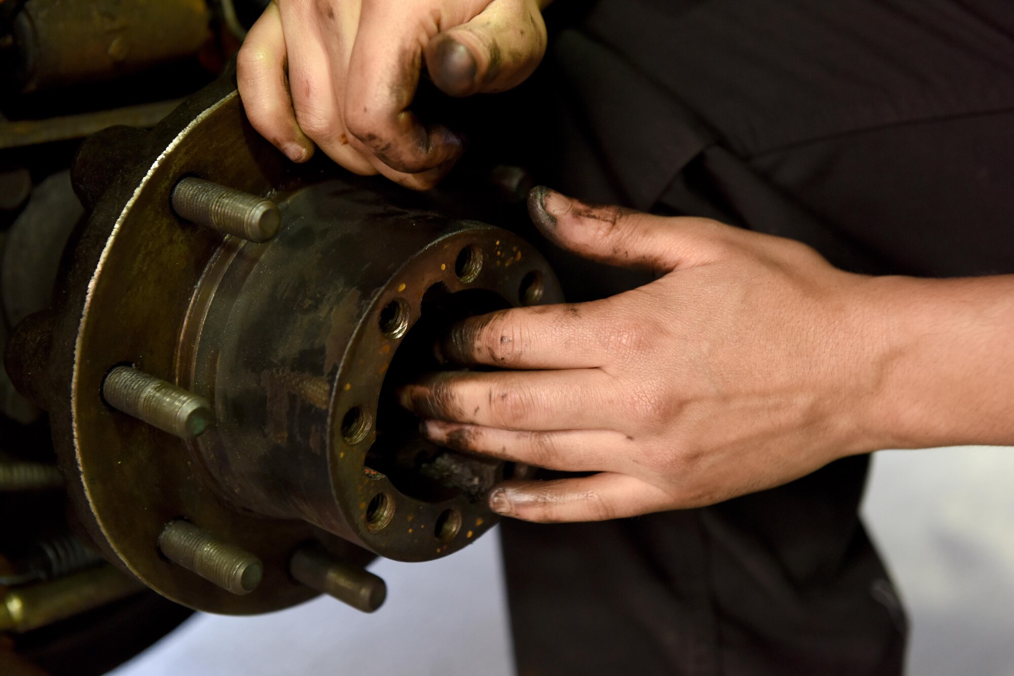A Vehicle Maintainer from the 48th Logistical Readiness Squadron checks axel bearings on a cargo van at Royal Air Force Lakenheath, June 7. Vehicle and Vehicular Equipment Maintainers ensure that all vehicles used by security forces, ground crew and Vehicle Operators function are in working order. (U.S. Air Force photo/Airman 1st Class John A. Crawford)