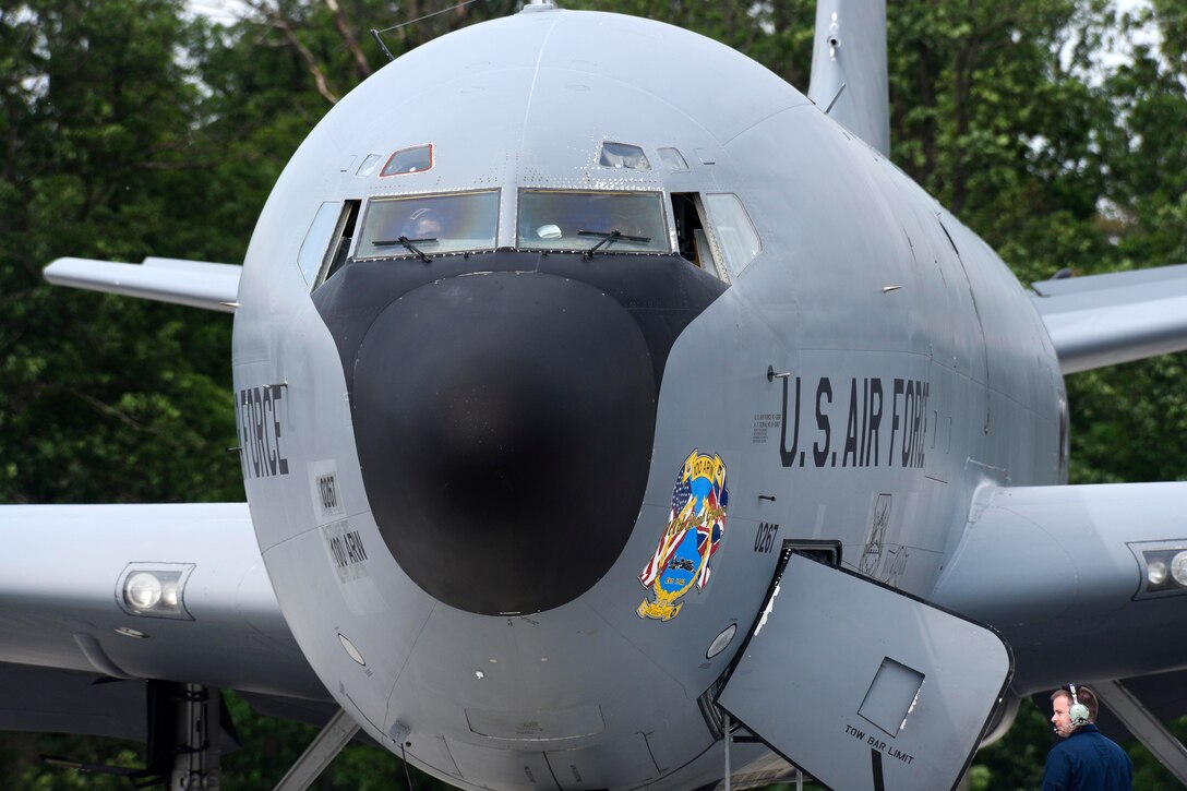 Air Force Staff Sgt. Sam Cobb, right, communicates with the pilots during a preflight check of a KC-135R Stratotanker before takeoff during Baltic Operations 2017 at Powidz Air Base, Poland, June 5, 2017. Cobb is a hydraulics technician assigned to the 100th Aircraft Maintenance Squadron. Air Force photo by Staff Sgt. Jonathan Snyder