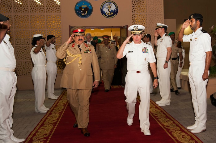 His Majesty, King Hamad bin Isa Al Khalifa, the King of the Kingdom of Bahrain and Vice Adm. Kevin M. Donegan, commander of U.S. 5th Fleet, depart U.S. Naval Forces Central Command headquarters June 12 after a meeting to discuss operations in the U.S. 5th Fleet and coalition operations to defeat ISIS. The King was accompanied by two of his sons, His Highness Brig. Gen. Shaikh Nasser bin Hamad Al Khalifa, Commander of the Royal Guard, and His Highness Maj. Shaikh Khaled bin Hamad Al Khalifa, Commander of the Royal Guard Special Force; the Commander-in-Chief of the Bahrain Defense Force, His Excellency Field Marshal Shaikh Khalifa bin Ahmed Al Khalifa; and the Commander of the Bahraini Royal Navy, His Excellency Rear Adm. Shaikh Khalifa bin Abdullah Al Khalifa. Bahrain has been a partner with the United States in regional maritime security for nearly 70 years.  