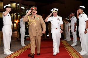 His Majesty, King Hamad bin Isa Al Khalifa, the King of the Kingdom of Bahrain, passes through sideboys with Vice Adm. Kevin M. Donegan, commander of U.S. 5th Fleet during a visit to discuss operations in the U.S. 5th Fleet area of operations and coalition operations to defeat ISIS, June 12. The King was accompanied by two of his sons, His Highness Brig. Gen. Shaikh Nasser bin Hamad Al Khalifa, Commander of the Royal Guard, and His Highness Maj. Shaikh Khaled bin Hamad Al Khalifa, Commander of the Royal Guard Special Force; the Commander-in-Chief of the Bahrain Defense Force, His Excellency Field Marshal Shaikh Khalifa bin Ahmed Al Khalifa; and the Commander of the Bahraini Royal Navy, His Excellency Rear Adm. Shaikh Khalifa bin Abdullah Al Khalifa. Bahrain has been a partner with the United States in regional maritime security for nearly 70 years.