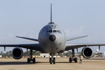 A crew chief maintains contact with the flight crew of a 305th Air Mobility Wing KC-10 Extender at the Combat Readiness Training Center at Gulfport, Miss., in support of Crisis Response '17 March 6, 2017 Close to 700 Air Mobility Command Airmen with the 514th Air Mobility Wing, the 305th Air Mobility Wing, the 87th Air Base Wing, and the 621st Contingency Response Wing are participating in the mobilization exercise. (U.S. Air Force photo by Master Sgt. Mark C. Olsen/Released)