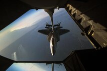 A KC-10 Extender from the 76th Air Refueling Squadron, 514th Air Mobility Wing, Joint Base McGuire-Dix-Lakehurst, N.J., refuels an F-22 Raptor over the Florida coast March 7, 2017. The F-22 is assigned to Tyndall Air Force Base, Fla. The 514th, in conjunction with the 305th Air Mobility Wing, the 87th Air Base Wing, and the 621st Contingency Response Wing are participating in Crisis mobilization exercise Response '17 at the Combat Readiness Training Center at Gulfport, Miss. (U.S. Air Force photo by Master Sgt. Mark C. Olsen/Released)