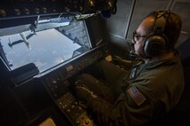 Master Sgt. John Katjor, boom operator, 76th Air Refueling Squadron, 514th Air Mobility Wing, Joint Base McGuire-Dix-Lakehurst, N.J., checks the boom prior to an F-22 Raptor refueling mission over the Florida coast March 7, 2017. The 514th, in conjunction with the 305th Air Mobility Wing, the 87th Air Base Wing, and the 621st Contingency Response Wing are participating in Crisis mobilization exercise Response '17 at the Combat Readiness Training Center at Gulfport, Miss. (U.S. Air Force photo by Master Sgt. Mark C. Olsen/Released)