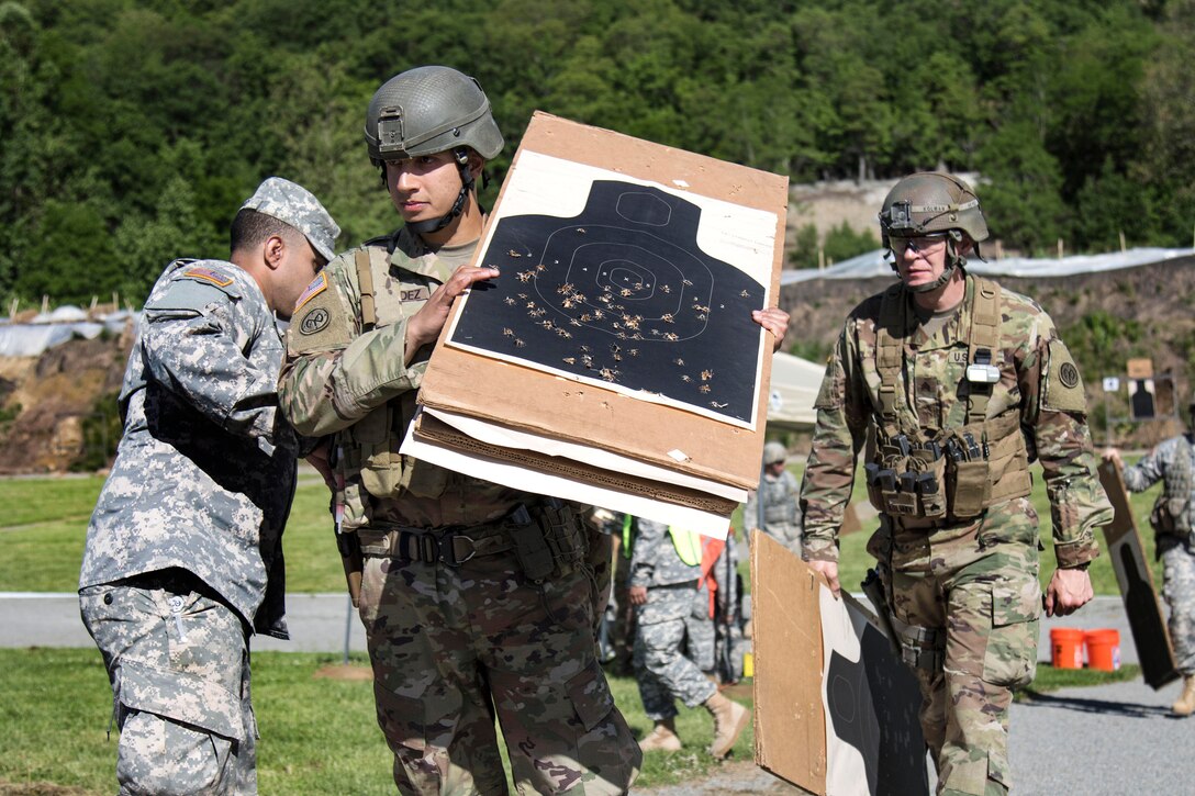 New York Army National Guardsmen wait to hand in their targets during competition at Camp Smith Training Site, N.Y., June 3, 2017. Army National Guard photo by Spc. Jonathan Pietrantoni