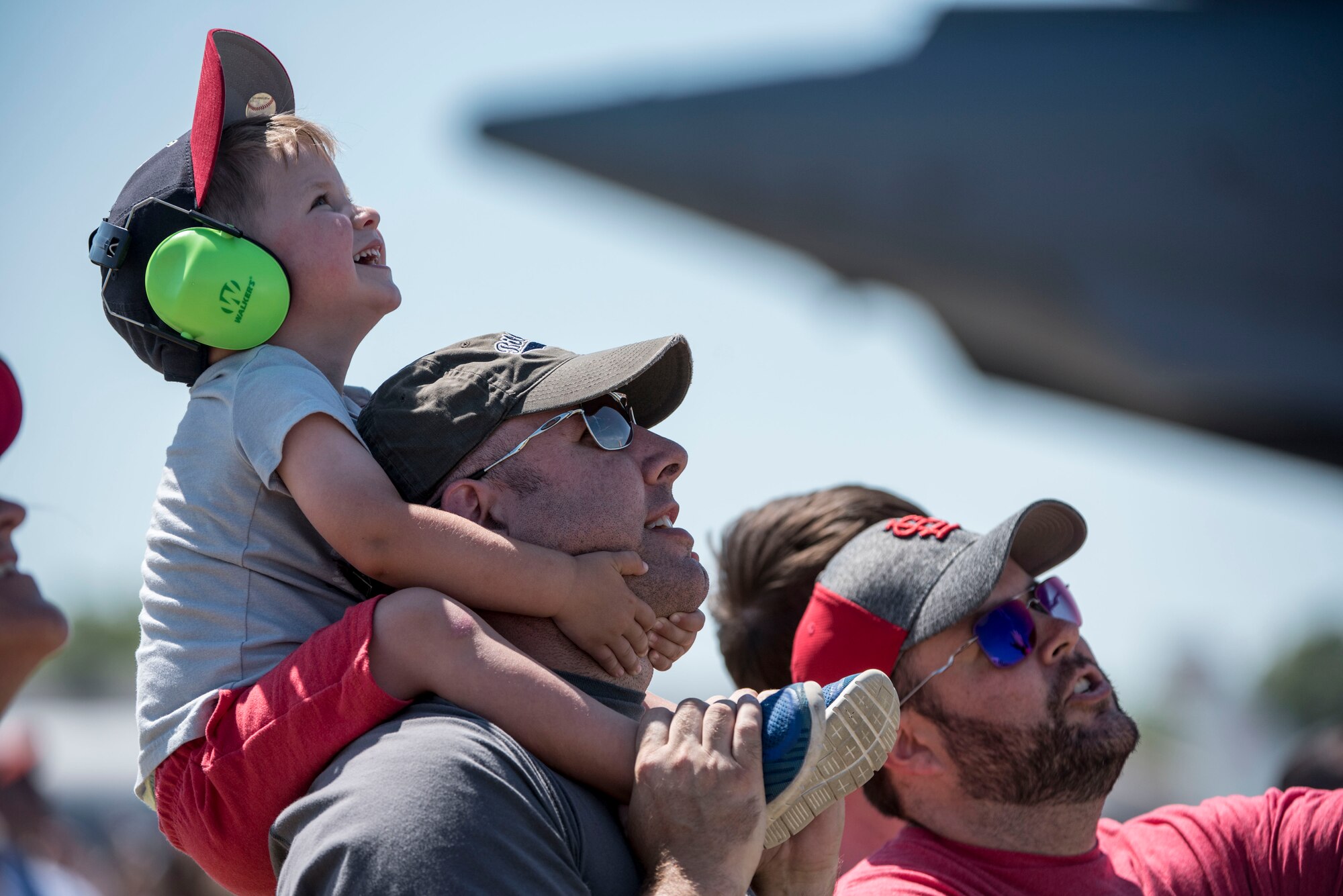 Spectators watch the Thunderbirds, officially known as the U.S. Air Force Air Demonstration Squadron, perform precision aerial maneuvers to demonstrate the capabilities the F-16 Fighter Falcon, the Air Force’s premier multi-role fighter jet, Scott Air Force Base, Ill., June 10, 2017.   The Thunderbirds performed their hour-long demonstration at speeds up to 600 mph and fly just a few feet of one another between wingtip to wingtip. This highly maneuverable fighter has proven to be one of the world's best precision tactical bomber and air-to-air combat aircraft.