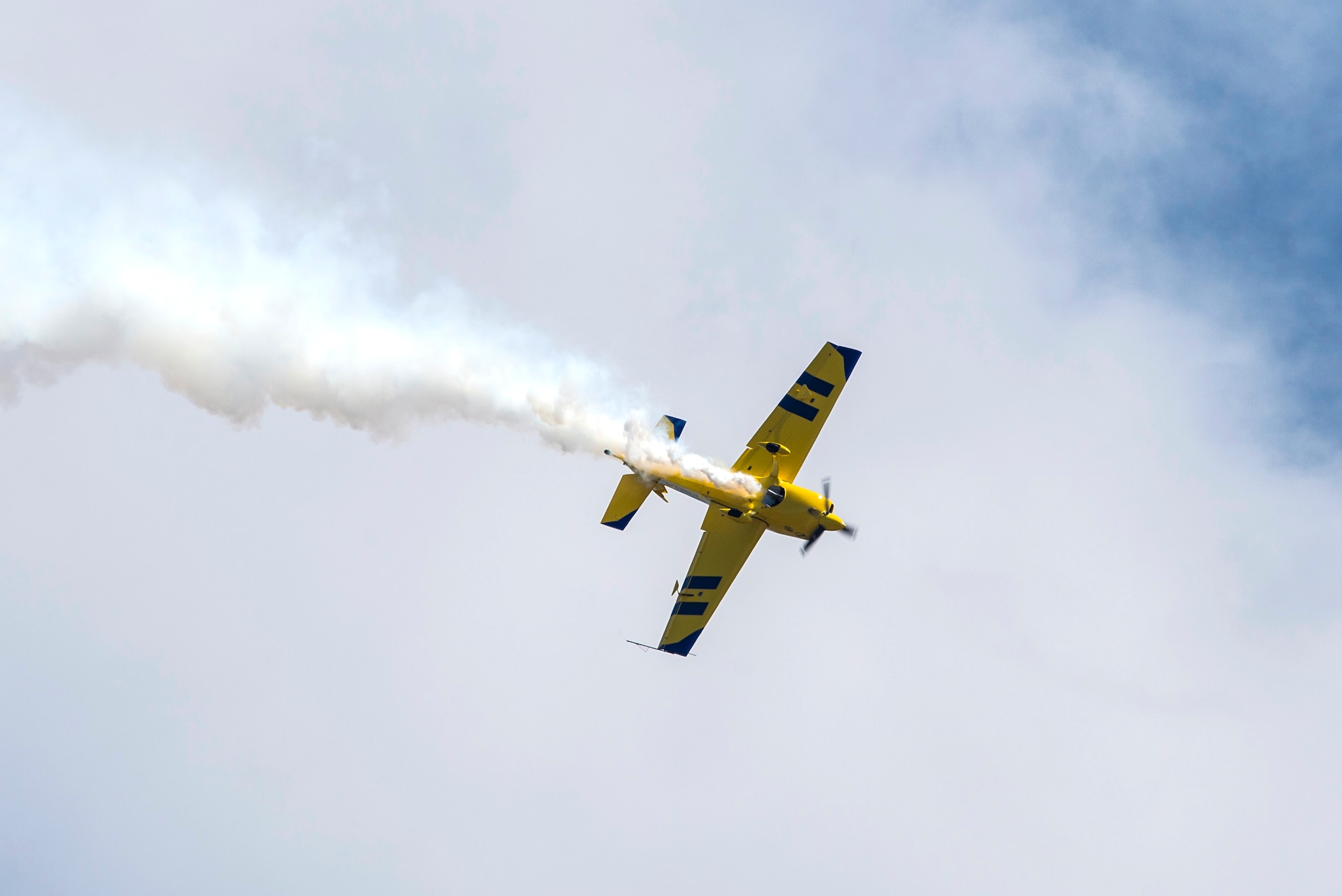 Kevin Coleman performs during the 100th Centennial Celebration Air Show, June 11, 2017, at Scott Air Force Base, Ill. Kevin has accumulated more than 2500 hours of flying time. He has been recognized as the highest placing contender at the 2007 Aerobatic Championship, and the next year clinched third place at the same event. He is contracted to perform year-round in the air show circuit across the country, and in 2015, a lifetime of practice paid off when he earned a position on the U.S. Advanced Aerobatic Team – the Olympics of aviation.