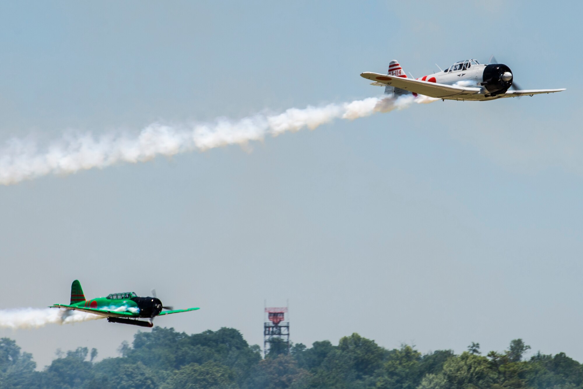 "Tora, Tora, Tora," performs the re-creation of the Dec. 7, 1941, attack on Pearl Harbor during the 100th Centennial Celebration Air Show, June 10, 2017, at Scott Air Force Base, Ill. The motto of the Commemorative Air Force and the "Tora" act is "Lest We Forget." Tora is not intended to promote nationalism or glorify war. The intent of the Tora group is to help generations of individuals throughout the world born after World War II understand that war does not discriminate in the pain it causes and that courageous individuals on both sides lose their lives. (U.S. Air Force photo/Senior Airman Tristin English)