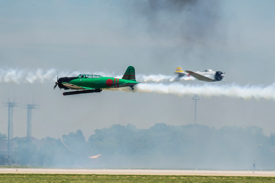 "Tora, Tora, Tora," performs the re-creation of the Dec. 7, 1941, attack on Pearl Harbor during the 100th Centennial Celebration Air Show, June 10, 2017, at Scott Air Force Base, Ill. The motto of the Commemorative Air Force and the "Tora" act is "Lest We Forget." Tora is not intended to promote nationalism or glorify war. The intent of the Tora group is to help generations of individuals throughout the world born after World War II understand that war does not discriminate in the pain it causes and that courageous individuals on both sides lose their lives. (U.S. Air Force photo/Senior Airman Tristin English)