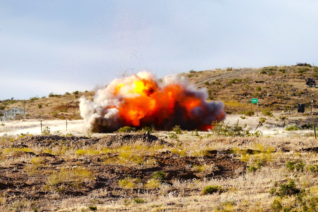 Mississippi Army National Guardsmen detonate a bangalore torpedo during a live-fire breaching exercise at the National Training Center, Fort Irwin, Calif., June 8, 2017. The guardsmen are assigned to the 1st Battalion, 155th Infantry Regiment. Mississippi National Guard photo by Spc. Christopher Shannon