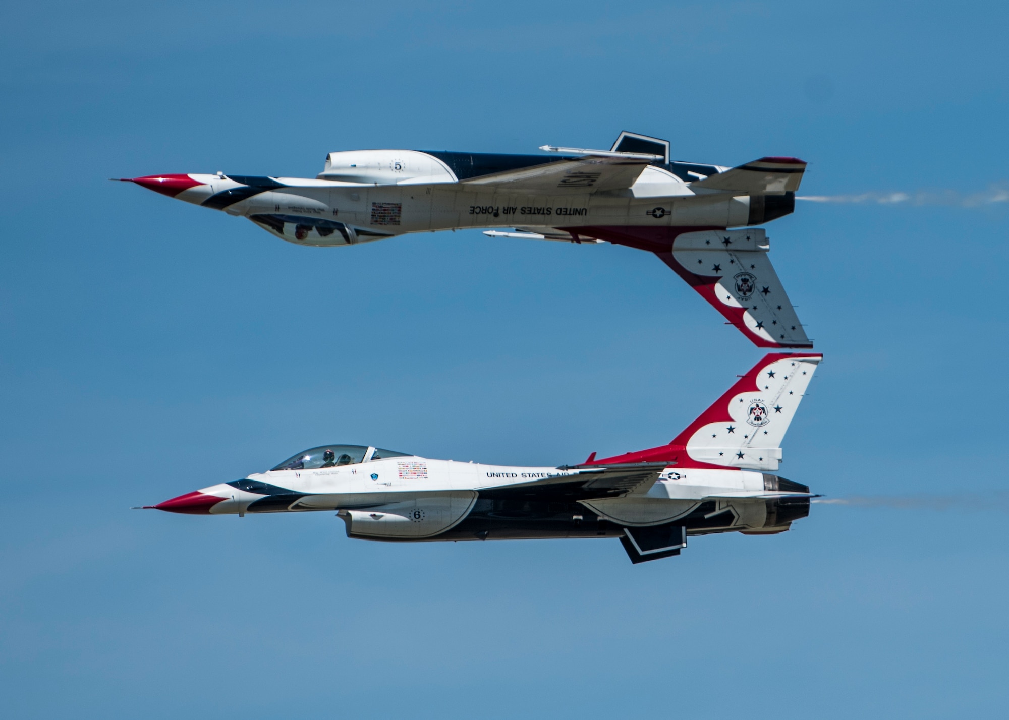 The Thunderbirds, officially known as the U.S. Air Force Air Demonstration Squadron, performs precision aerial maneuvers to demonstrate the capabilities the F-16 Fighter Falcon, the Air Force’s premier multi-role fighter jet, Scott Air Force Base, Ill., June 10, 2017.   The Thunderbirds performed their hour-long demonstration at speeds up to 600 mph and fly just a few feet of one another between wingtip to wingtip. This highly maneuverable fighter has proven to be one of the world's best precision tactical bomber and air-to-air combat aircraft.