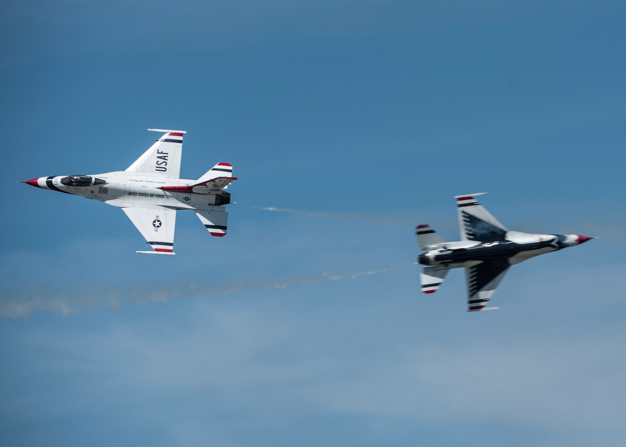 The Thunderbirds, officially known as the U.S. Air Force Air Demonstration Squadron, performs precision aerial maneuvers to demonstrate the capabilities the F-16 Fighter Falcon, the Air Force’s premier multi-role fighter jet, Scott Air Force Base, Ill., June 10, 2017.   The Thunderbirds performed their hour-long demonstration at speeds up to 600 mph and fly just a few feet of one another between wingtip to wingtip. This highly maneuverable fighter has proven to be one of the world's best precision tactical bomber and air-to-air combat aircraft.