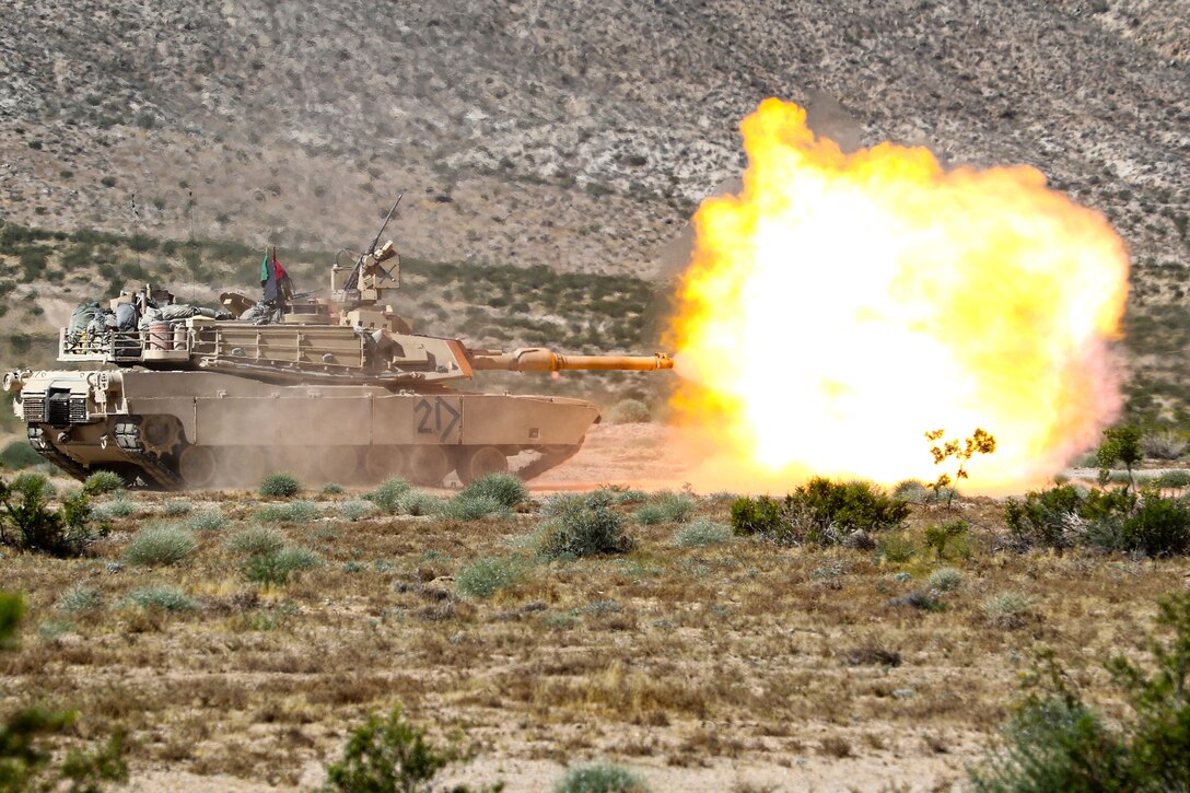 Mississippi Army National Guardsmen fire a 120 mm sabot round from an M1A1 Abrams main battle tank's gun during a live-fire exercise at the National Training Center, Fort Irwin, Calif., June 9, 2017. The soldiers are assigned to the 155th Armored Brigade Combat Team, 2d Battalion, 198th Armored Regiment. Mississippi National Guard photo by Staff Sgt. Shane Hamann
