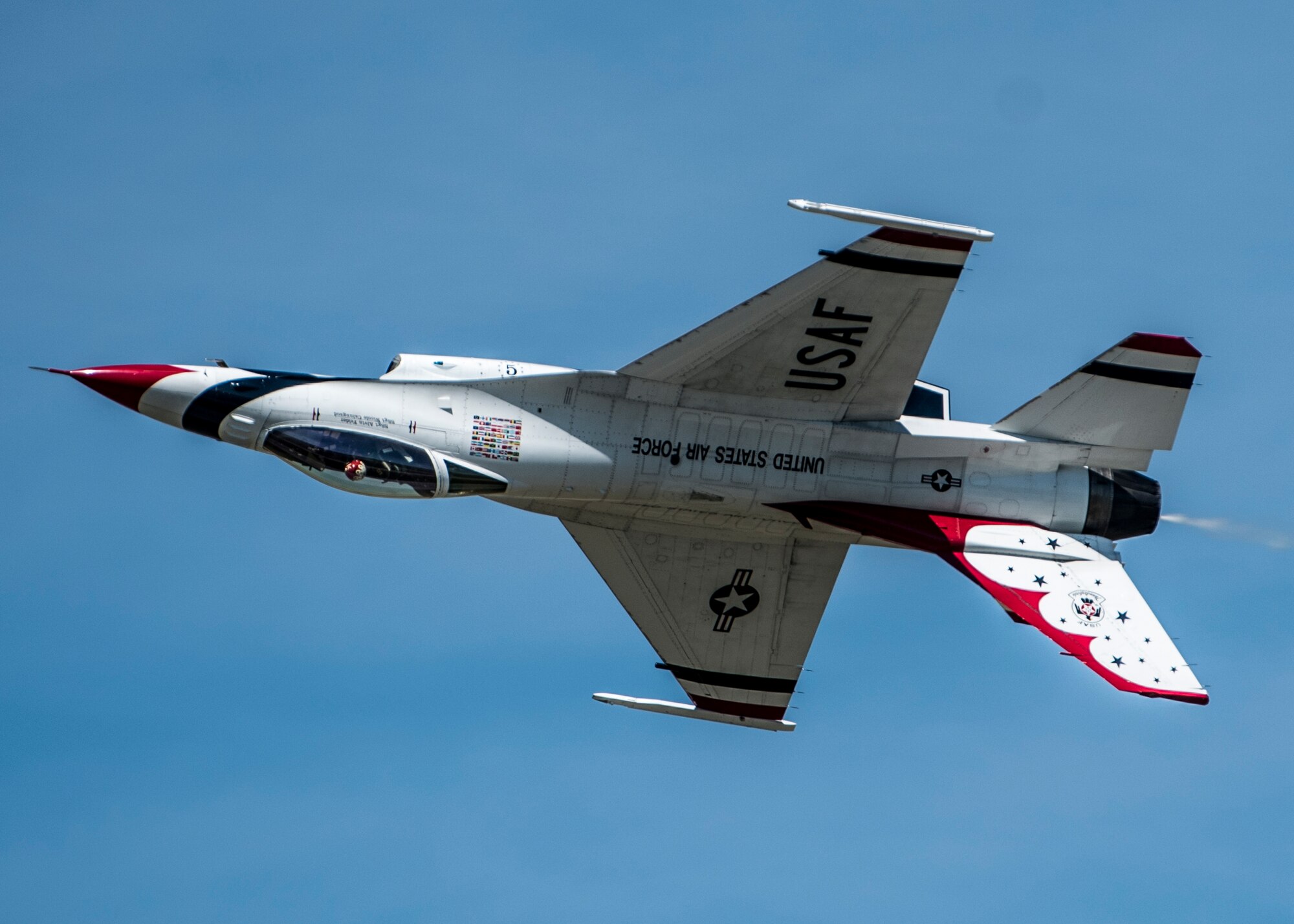 The Thunderbirds, officially known as the U.S. Air Force Air Demonstration Squadron, performs precision aerial maneuvers to demonstrate the capabilities the F-16 Fighter Falcon, the Air Force’s premier multi-role fighter jet, Scott Air Force Base, Ill., June 10, 2017.   The Thunderbirds performed their hour-long demonstration at speeds up to 600 mph and fly just a few feet of one another between wingtip to wingtip. This highly maneuverable fighter has proven to be one of the world's best precision tactical bomber and air-to-air combat aircraft.