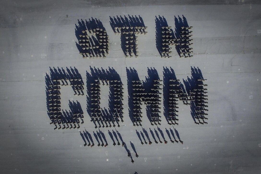 Marines with 9th Communication Battalion stand in formation to represent the battalion name at Marine Corps Base Camp Pendleton, Calif., April 27, 2017.