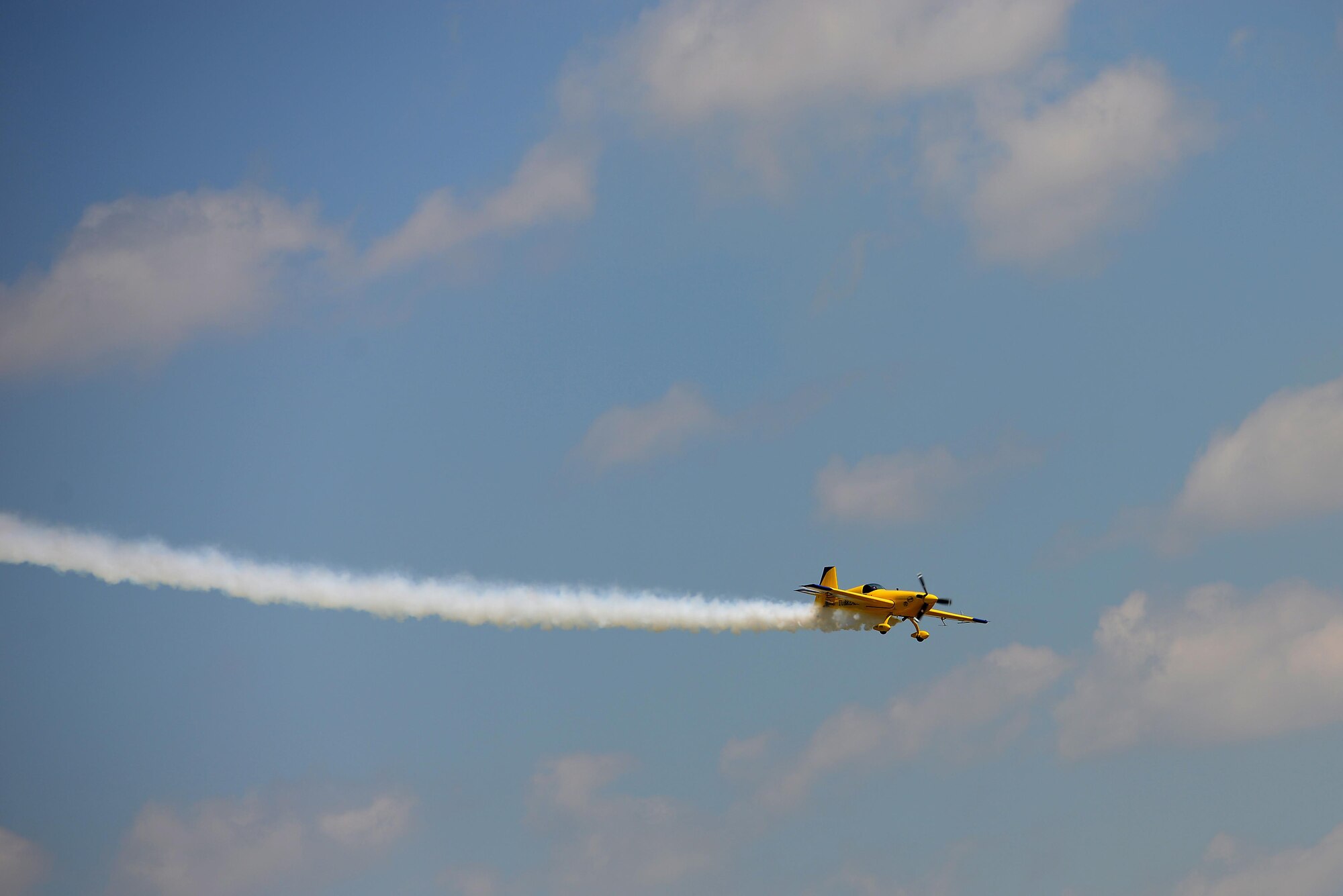 Kevin Coleman performs during the 100th Centennial Celebration Air Show, June 10, 2017, at Scott Air Force Base, Ill. Kevin has accumulated more than 2500 hours of flying time. He has been recognized as the highest placing contender at the 2007 Aerobatic Championship, and the next year clinched third place at the same event. He is contracted to perform year-round in the air show circuit across the country, and in 2015, a lifetime of practice paid off when he earned a position on the U.S. Advanced Aerobatic Team – the Olympics of aviation. (U.S. Air Force photo by Tech. Sgt. Jonathan Fowler)