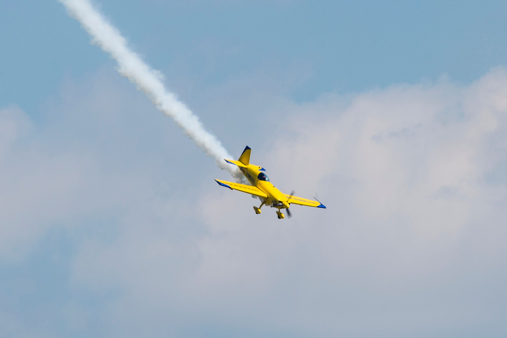 Kevin Coleman performs during the 100th Centennial Celebration Air Show, June 11, 2017, at Scott Air Force Base, Ill. Kevin has accumulated more than 2500 hours of flying time. He has been recognized as the highest placing contender at the 2007 Aerobatic Championship, and the next year clinched third place at the same event. He is contracted to perform year-round in the air show circuit across the country, and in 2015, a lifetime of practice paid off when he earned a position on the U.S. Advanced Aerobatic Team – the Olympics of aviation.