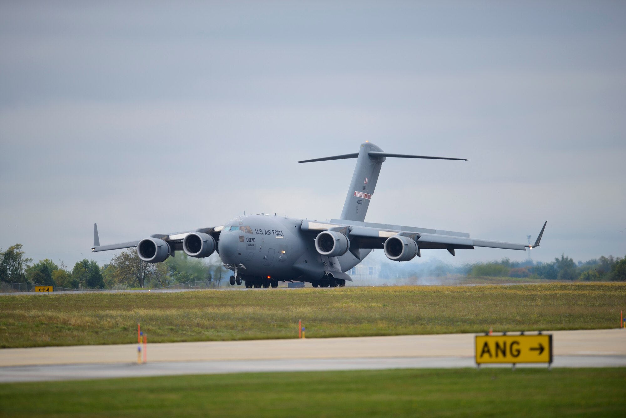 A C-17 Globemaster III touches down at Shepherd Field, Sept. 25, 2014. The aircraft was the first C-17 to be assigned to the 167th Airlfit Wing as it converted aircraft missions from the C-5 Galaxy to the C-17. (U.S. Air National Guard photo by Texh. Sgt. Michael Dickson)
