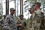 U.S. Air Force Gen. Joseph L. Lengyel, chief of the National Guard Bureau, meets with members of the 1775th Military Police Company, 210th Military Police Battalion, 177th Military Police Brigade, Michigan Army National Guard; and 3rd Battalion, 157th Field Artillery Regiment, 169th Fires Brigade, Colorado Army National Guard. 