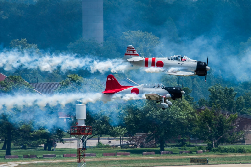 "Tora, Tora, Tora," performs the re-creation of the Dec. 7, 1941, attack on Pearl Harbor during the 100th Centennial Celebration Air Show, June 11, 2017, at Scott Air Force Base, Ill. The motto of the Commemorative Air Force and the "Tora" act is "Lest We Forget." Tora is not intended to promote nationalism or glorify war. The intent of the Tora group is to help generations of individuals throughout the world born after World War II understand that war does not discriminate in the pain it causes and that courageous individuals on both sides lose their lives. (U.S. Air Force photo/Senior Airman Tristin English)