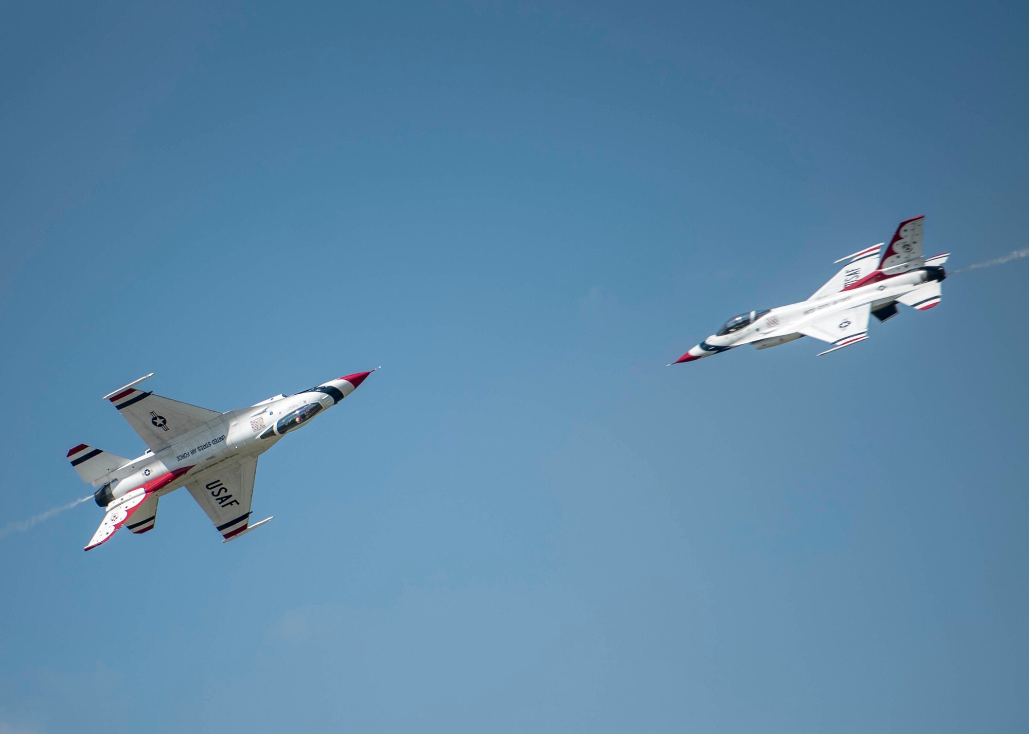 The Thunderbirds, officially known as the U.S. Air Force Air Demonstration Squadron, performs precision aerial maneuvers to demonstrate the capabilities the F-16 Fighter Falcon, the Air Force’s premier multi-role fighter jet, Scott Air Force Base, Ill., June 11, 2017.   Eight highly experienced fighter pilots, four support officers, three civilians, and over 120 enlisted personnel help make it possible for the team to showcase the capabilities of this fighter jet to millions of people each year.  Together, this team has ensured that a demonstration has never been cancelled due to maintenance difficulty. (U.S. Air Force photo by Staff Sgt. Jodi Marttinez)