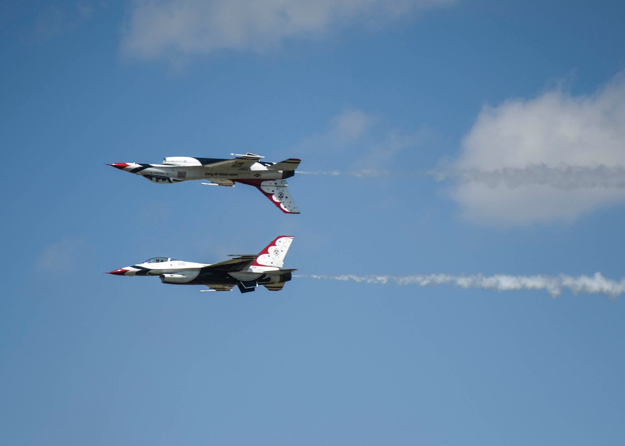 The Thunderbirds, officially known as the U.S. Air Force Air Demonstration Squadron, performs precision aerial maneuvers to demonstrate the capabilities the F-16 Fighter Falcon, the Air Force’s premier multi-role fighter jet, Scott Air Force Base, Ill., June 11, 2017.   Eight highly experienced fighter pilots, four support officers, three civilians, and over 120 enlisted personnel help make it possible for the team to showcase the capabilities of this fighter jet to millions of people each year.  Together, this team has ensured that a demonstration has never been cancelled due to maintenance difficulty. (U.S. Air Force photo by Staff Sgt. Jodi Marttinez)