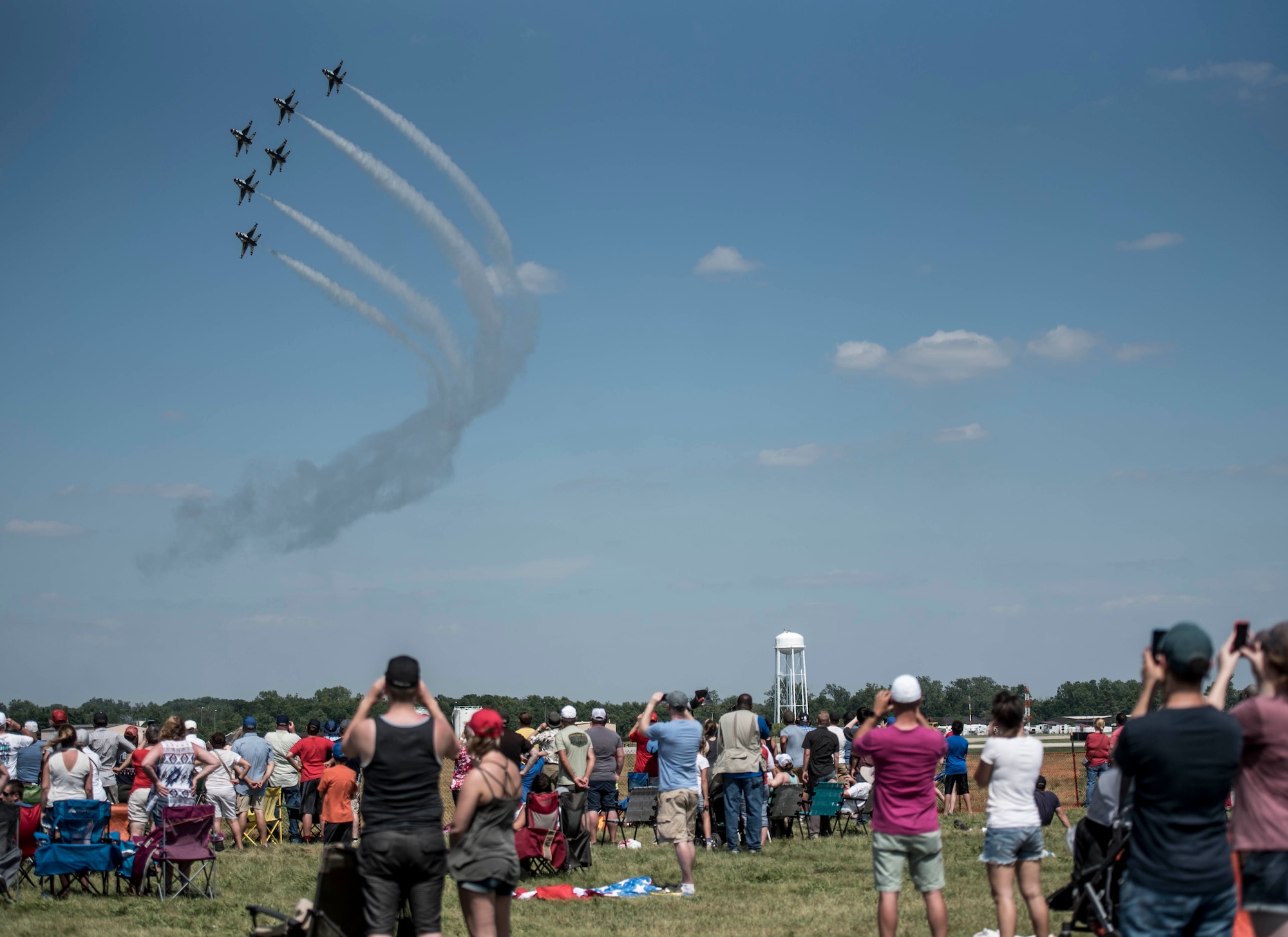 The Thunderbirds, officially known as the U.S. Air Force Air Demonstration Squadron, performs precision aerial maneuvers to demonstrate the capabilities the F-16 Fighter Falcon, the Air Force’s premier multi-role fighter jet, Scott Air Force Base, Ill., June 11, 2017.   Eight highly experienced fighter pilots, four support officers, three civilians, and over 120 enlisted personnel help make it possible for the team to showcase the capabilities of this fighter jet to millions of people each year.  Together, this team has ensured that a demonstration has never been cancelled due to maintenance difficulty. (U.S. Air Force photo by Staff Sgt. Jodi Marttinez)