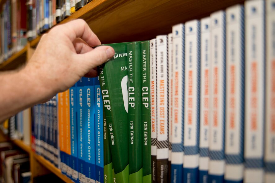 An entire section of the library at Little Rock Air Force Base, Ark., is dedicated to College Level Examination Program (CLEP) and Defense Activity For Non-Traditional Education Support (DANTES) testing resources. Utilizing these materials can save time and money for Airmen wanting to earn college credits. (U.S. Air Force photo by Master Sgt. Jeff Walston/Released)