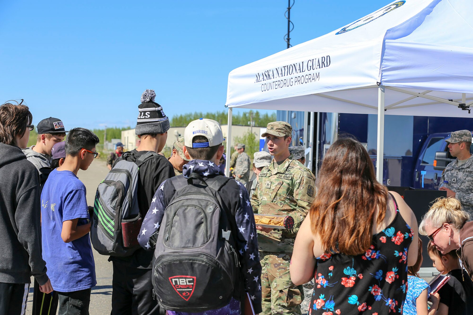 Alaska National Guard Sgt. Austin Makowski, civil operator with the Counterdrug Support Program, uses a training aid to discuss the effects of drug and alcohol to local youth at the Edward G. Pitka Sr. Airport in Galena, Alaska, May 31, 2017. Part of the CDSP mission is to provide community-based drug awareness programs throughout the state of Alaska. (U.S. Army National Guard photo by Staff Sgt. Balinda O’Neal Dresel)
