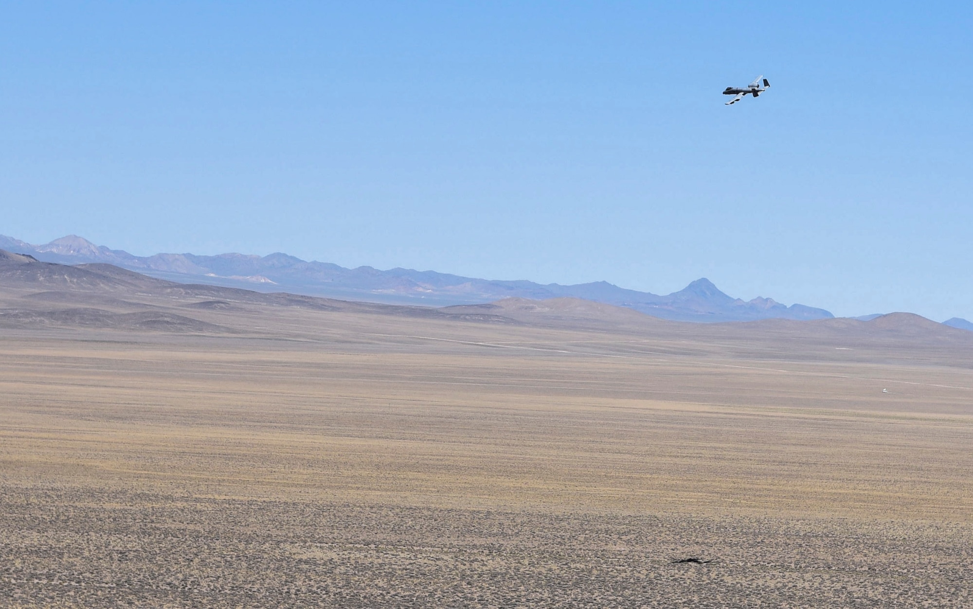 An A-10 Thunderbolt II, assigned to the 57th Wing, provides close ground support for a simulated combat search and rescue exercise during a Weapons School Integration mission at the Nevada Test and Training Range June 1, 2017. The Thunderbolt II is capable of providing close air support, and attacking ground targets like tanks and other armored vehicles. (U.S. Air Force photo by Airman 1st Class Andrew D. Sarver/Released)