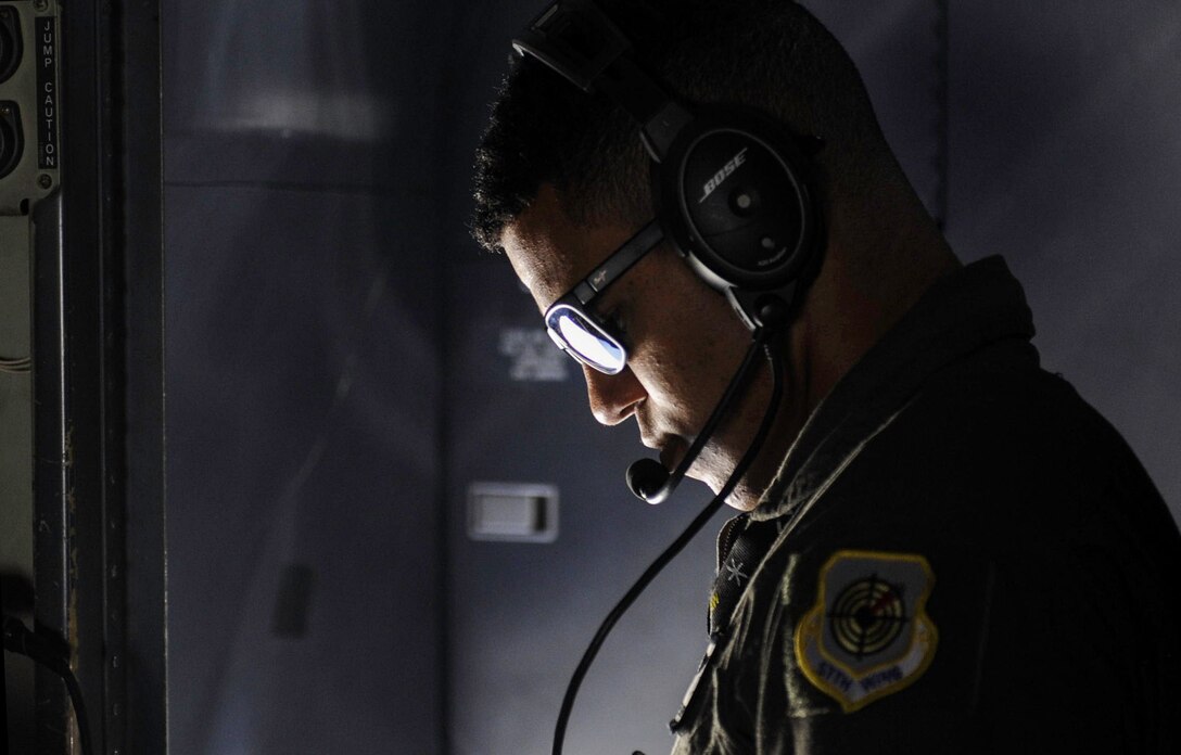 A crew chief prepares the cargo area of a C-130J Super Hercules before a Weapons School Integration mission at Nellis Air Force Base, Nev., June 2, 2017. Every six months, the United States Air Force Weapons School produces approximately 80 graduates who are expert instructors on weapons, weapons systems, and air and space integration. (U.S. Air Force photo by Senior Airman Kevin Tanenbaum/Released) 