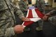 Fairchild Air Force Base honor guardsmen practice a six-man flag fold June 12, 2017, at Fairchild AFB, Washington. Fairchild’s ceremonial guardsmen maintain a region of 62,000 square miles, which covers many counties in Washington, Idaho and Oregon. In their area of responsibility, the honor guard is responsible for performing military honors to deceased Air Force veterans and retirees. (U.S. Air Force photo/SrA Sean Campbell)