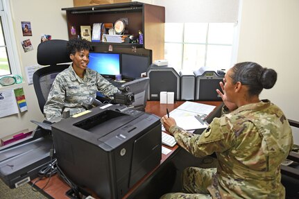 Staff Sgt. Jenerian Walters, Joint Task Force-Bravo personnel office, tends to a customer at her office at Soto Cano Air Base, Honduras, June 5th, 2017. Staff Sgt. Walters works as the Admin non-commissioned officer at JTF-Bravo’s personnel office and her Call to Duty includes making sure everyone has the proper credentials and working Common Access Cards for their computers. 