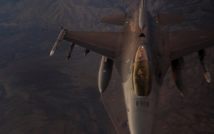 An F-16 Fighting Falcon fighter jet, assigned to the 16th Weapons Squadron at Nellis Air Force Base, Nev., participates in a Weapons School Integration mission June 8, 2017. In an air combat role, the F-16’s maneuverability and combat radius exceed that of all potential threat fighter aircraft. (U.S. Air Force photo by Senior Airman Kevin Tanenbaum/Released)