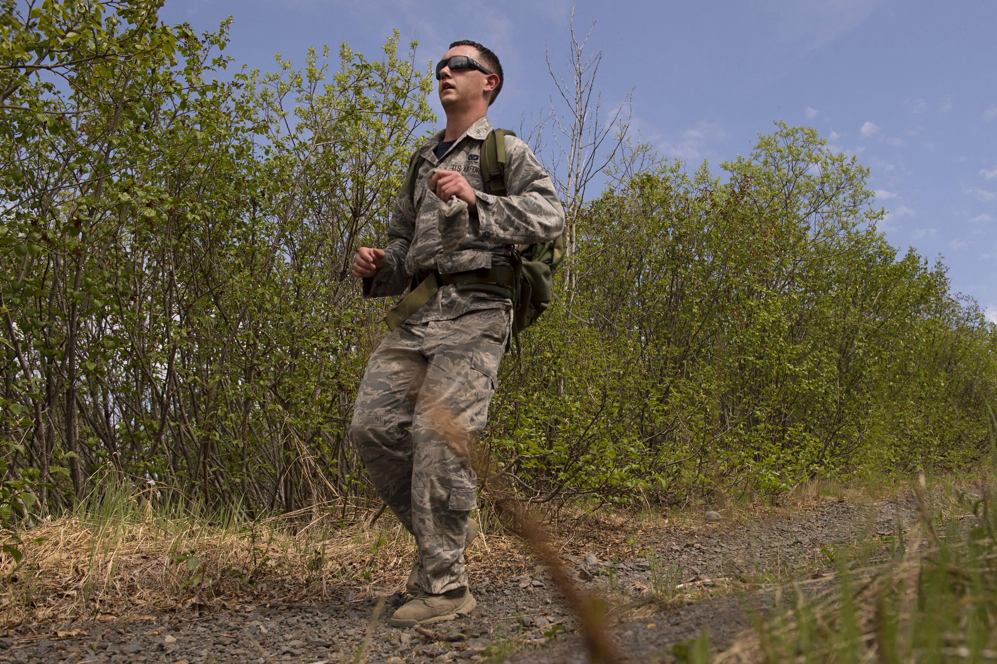 Senior Airman Andrew Mills, 773d Civil Engineer Squadron, participates in the Combat Cross-Country Series Three-Mile Mountain Run at Arctic Valley, Alaska, June 9, 2017. Team members from 773d CES took first place in the competition. 