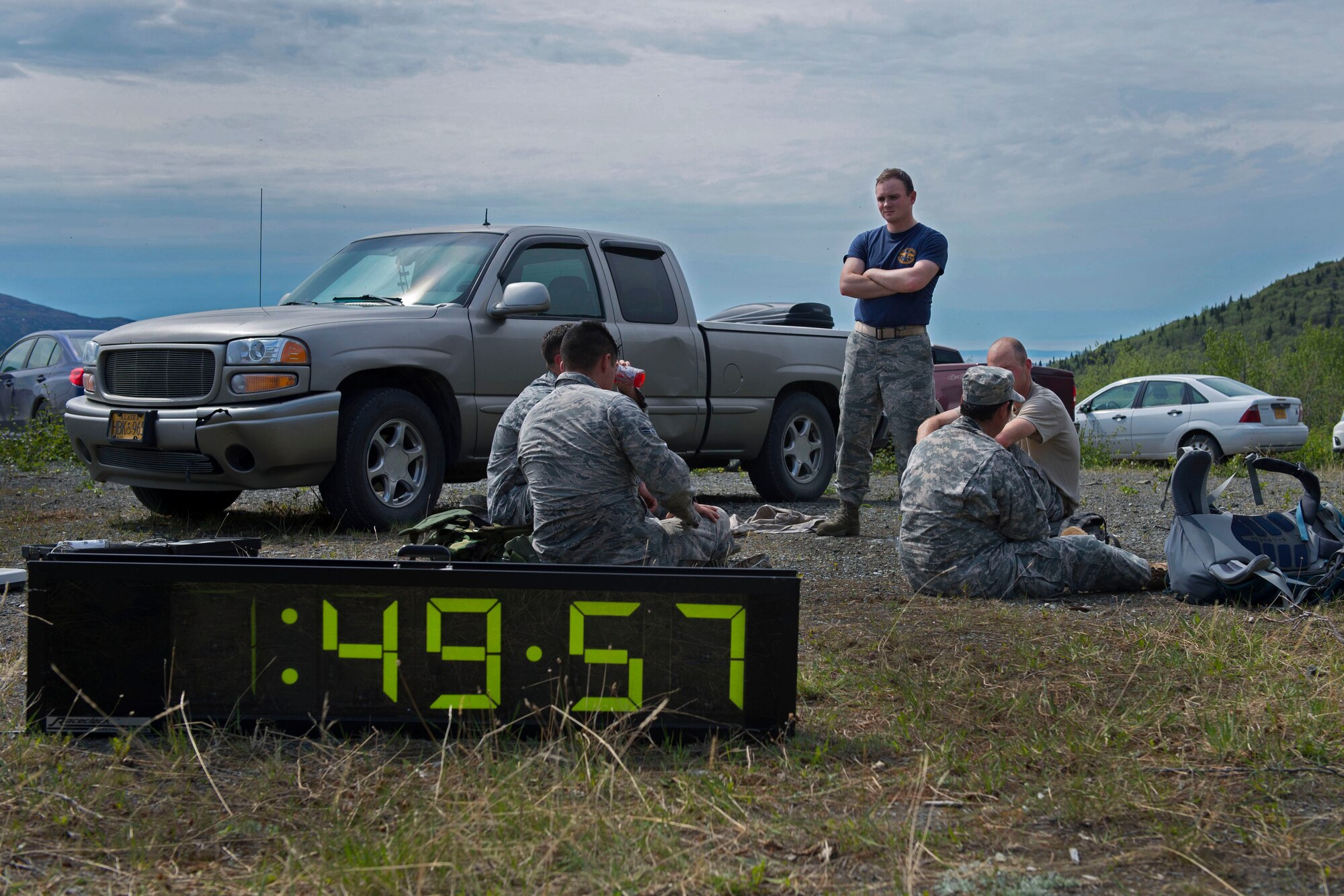 Joint Base Elmendorf-Richardson service members rest after participating in the Combat Cross-Country Series Three-Mile Mountain Run at Arctic Valley, Alaska, June 9, 2017. Team members from 773d Civil Engineer Squadron took first place in the competition. 