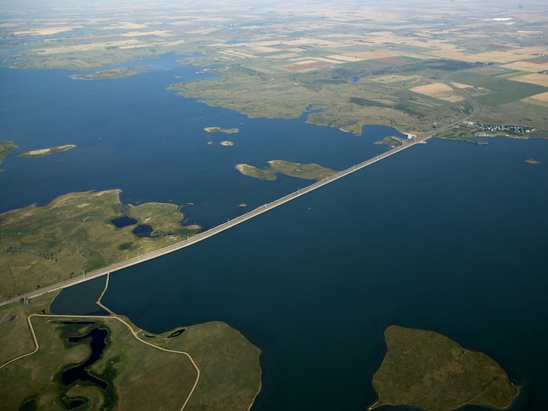Snake Creek embankment with Highway 83 atop and Lake Sakakawea on the left and Lake Audubon on the right. 