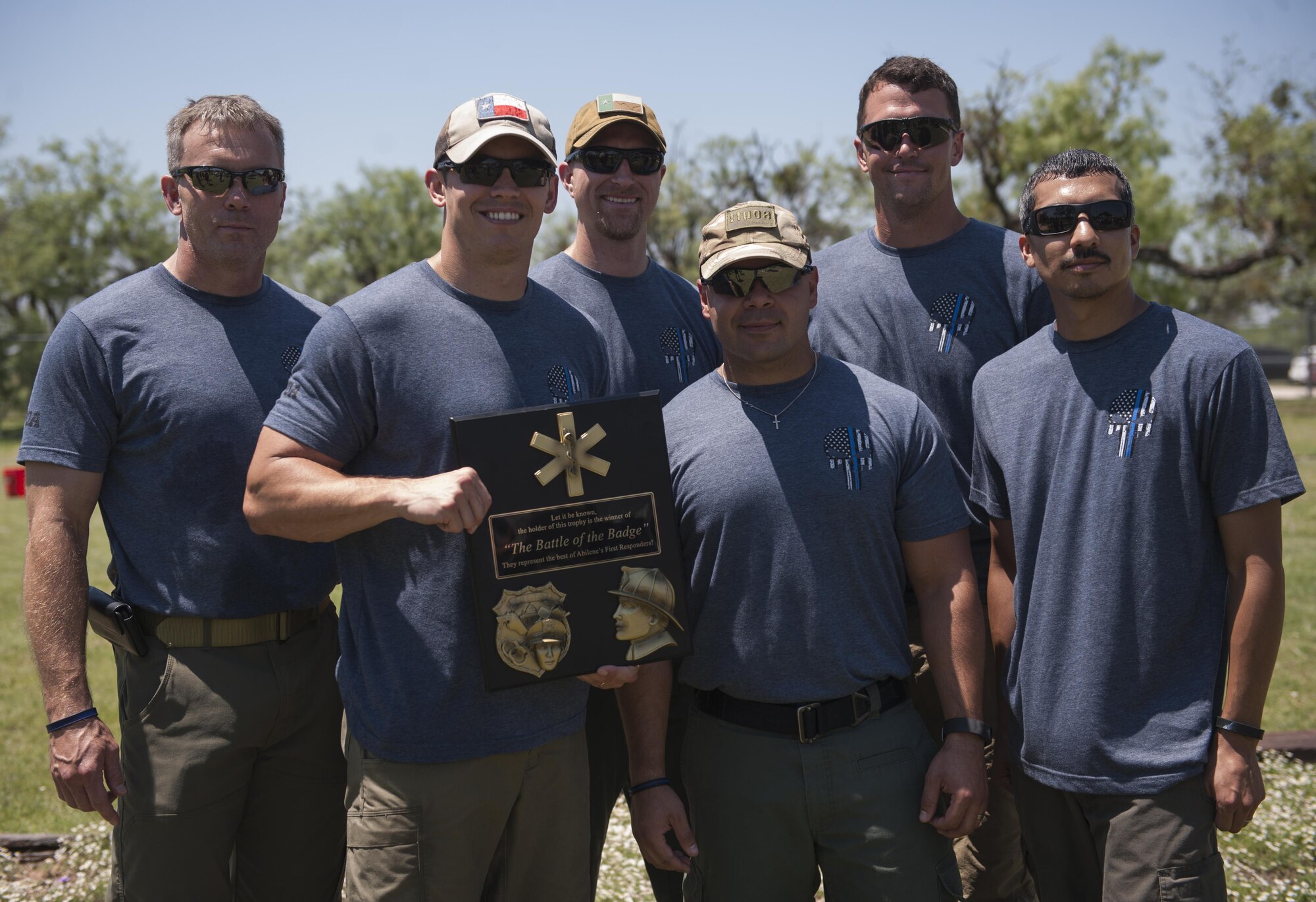 The Abilene Police Department team wins the first Battle of the Badges at Dyess Air Force Base, Texas, June 10, 2017.  The competing teams included: the Abilene Police Department, Abilene Fire Department and Dyess AFB Fire Department. (U.S. Air Force photo by Airman 1st Class April Lancto)