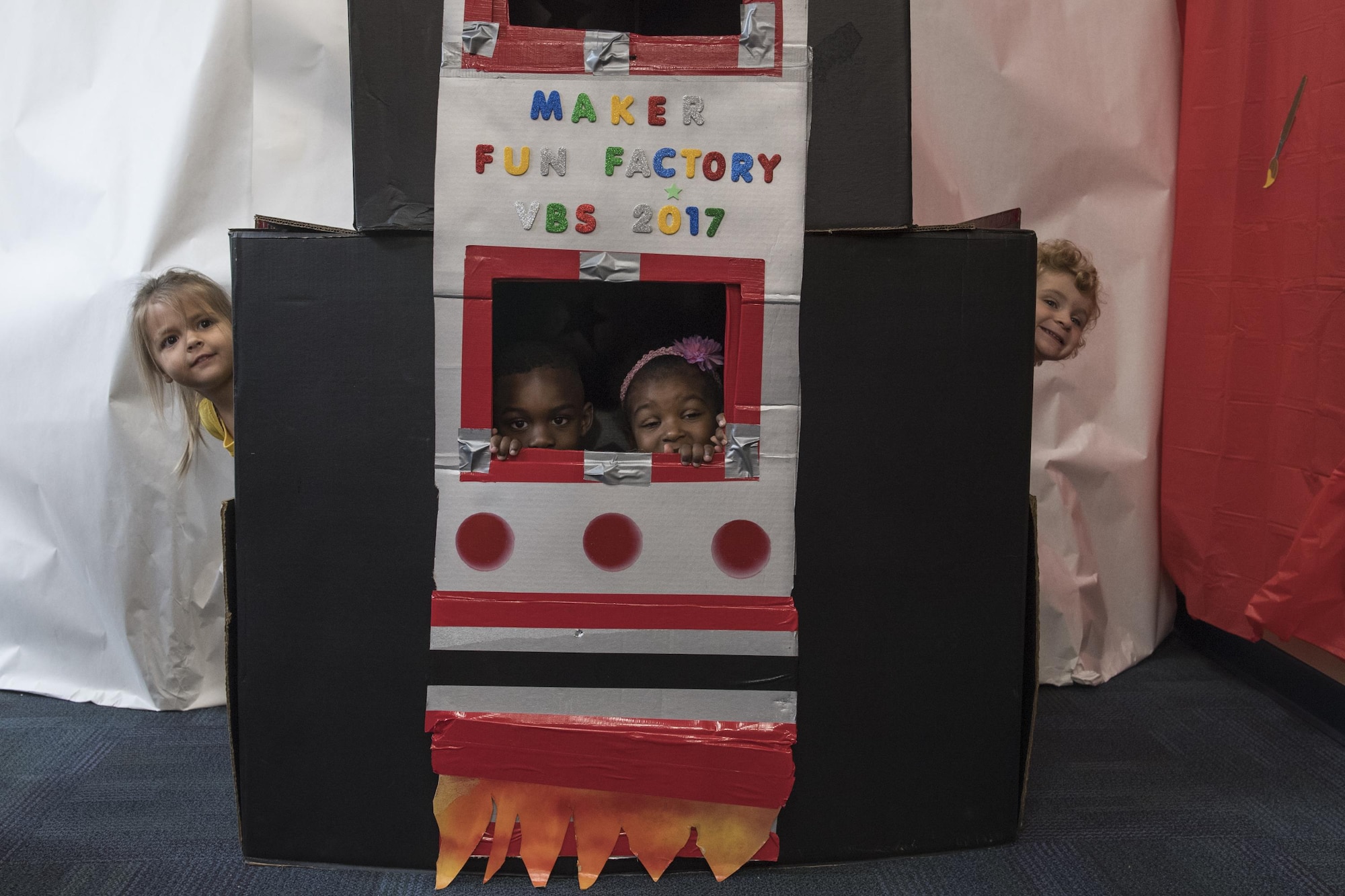 Children in the pre-kindergarten Vacation Bible School class play during the base chapel's VBS, June 7, 2017 at Moody Air Force Base, Ga. More than 80 people volunteered for this year's VBS and 105 children attended. (U.S. Air Force photo by Tech. Sgt. Zachary Wolf)